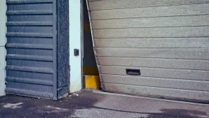 A damaged garage door left open
